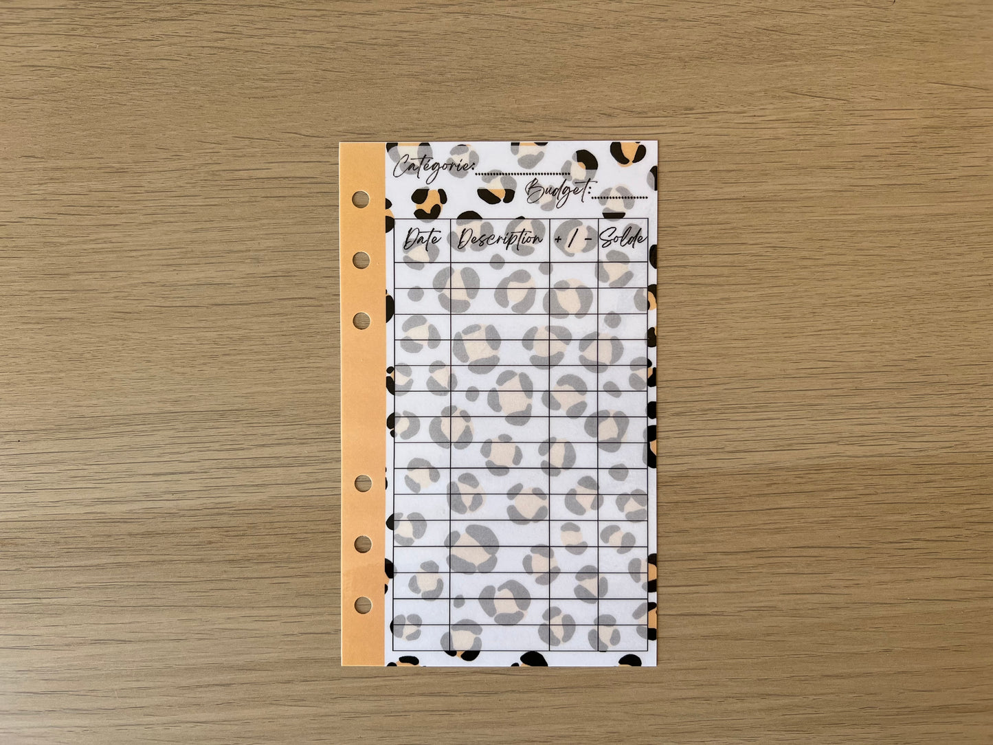 Tracker plastifié perforé A6