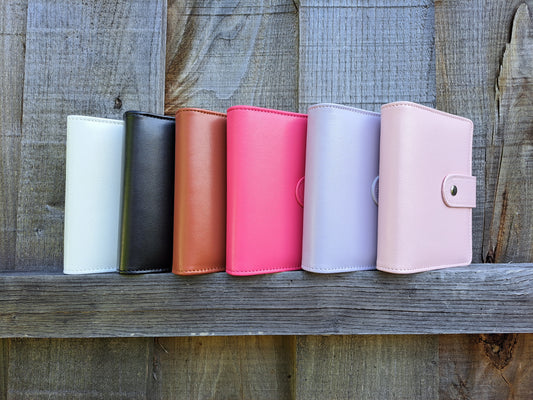 Pack classeur budget A7 avec 6 enveloppes, 6 trackers, 1 marqueur indélébile et une gomme magique