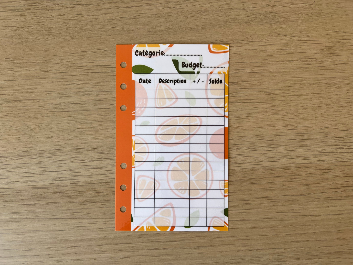 Tracker plastifié perforé A6